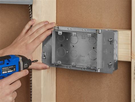 how to remove metal electrical box from wall|removing electric box from drywall.